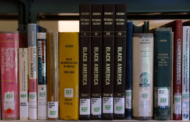 Books line the shelves in the Research Archival room at the Blair-Caldwell African American Research Library in Five Points on June 9, 2017, in Denver. (Photo by Kathryn Scott/The Denver Post)