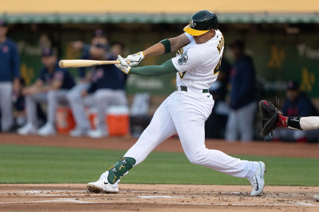 Jul 17, 2023; Oakland, California, USA; Oakland Athletics first baseman Ryan Noda (49) hits a single during the first inning against the Boston Red Sox at Oakland-Alameda County Coliseum. Mandatory Credit: Stan Szeto-USA TODAY Sports