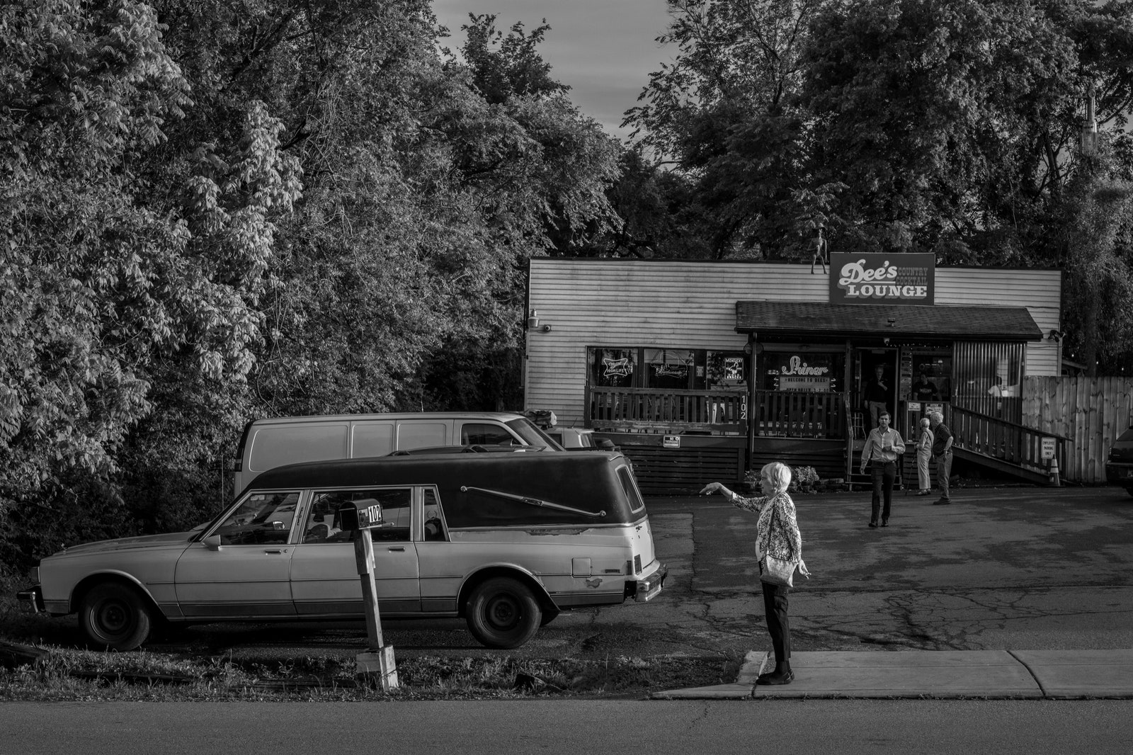 A person stands outside Dees a music venue in East Nashville.