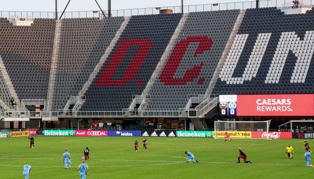 DC United: US sports trainer fired for 'discriminatory' hand gesture