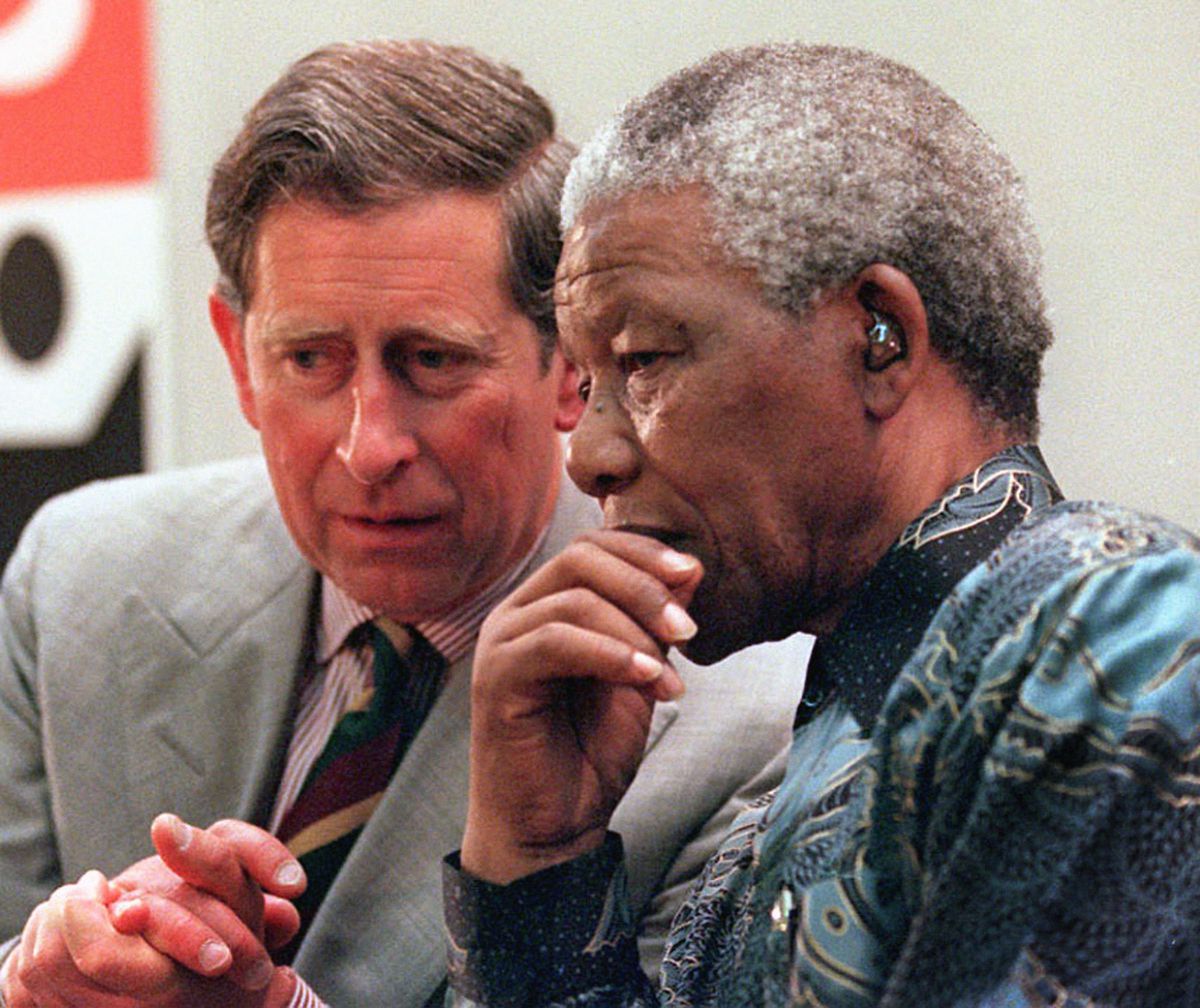 Mr Mandela and the then Prince of Wales as they visit Brixton 