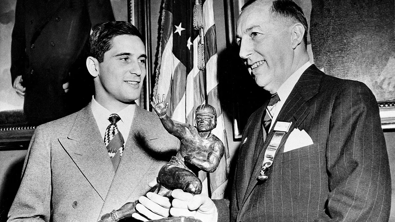 Johnny Lujack gets a Heisman Trophy