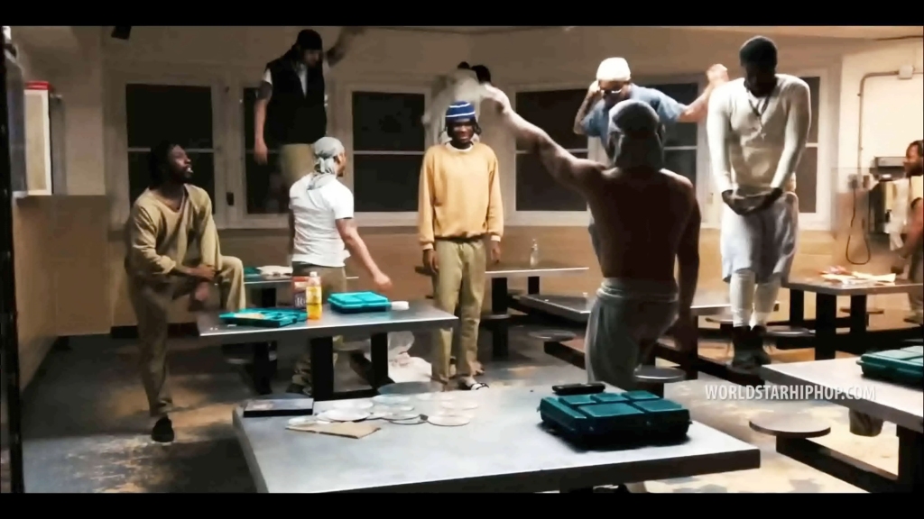 Inmates in the video in a common area.