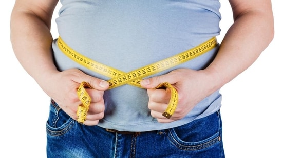 If you are largely sedentary, and rarely move your body, your belly fat is unlikely to bid adieu anytime soon. (Shutterstock)