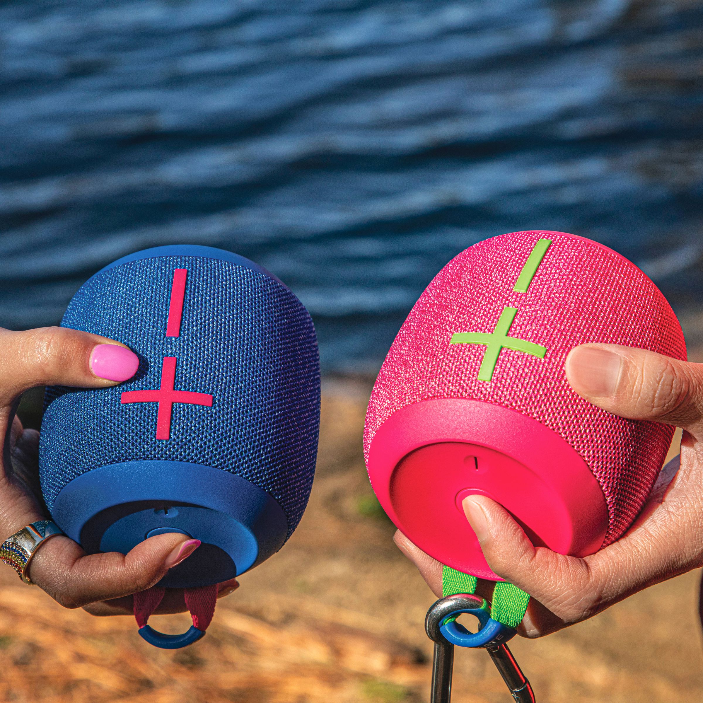 Two Wonderboom 3 speakers in pink and blue.