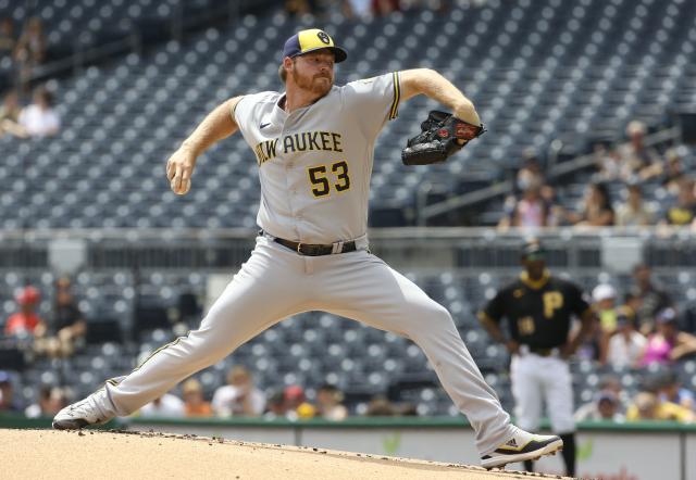 Brewers starting pitcher Brandon Woodruff delivers a pitch against the Pittsburgh Pirates on Aug. 4, 2022.