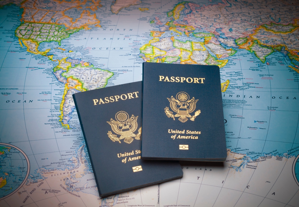 Passports laying on world map