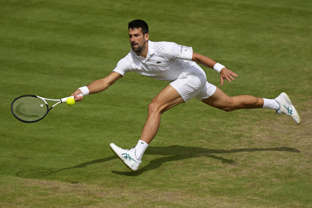 Serbia&#39;s Novak Djokovic returns to Spain&#39;s Carlos Alcaraz in the final of the men&#39;s singles on day fourteen of the Wimbledon tennis championships in London, Sunday, July 16, 2023. (AP Photo/Alastair Grant)