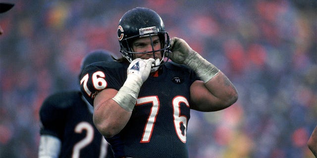 Steve McMichael removed his helmet