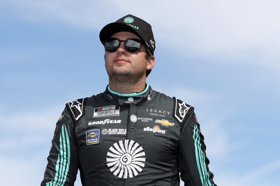 LAS VEGAS, NEVADA - MARCH 05: Noah Gragson, driver of the #42 Sunseeker Resort Chevrolet, walks onstage during driver intros prior to the NASCAR Cup Series Pennzoil 400 at Las Vegas Motor Speedway on March 05, 2023 in Las Vegas, Nevada. (Photo by Meg Oliphant/Getty Images)