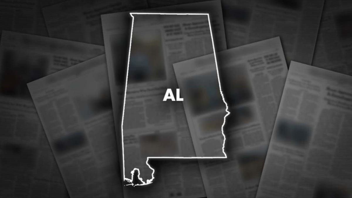 image of state of Alabama over papers