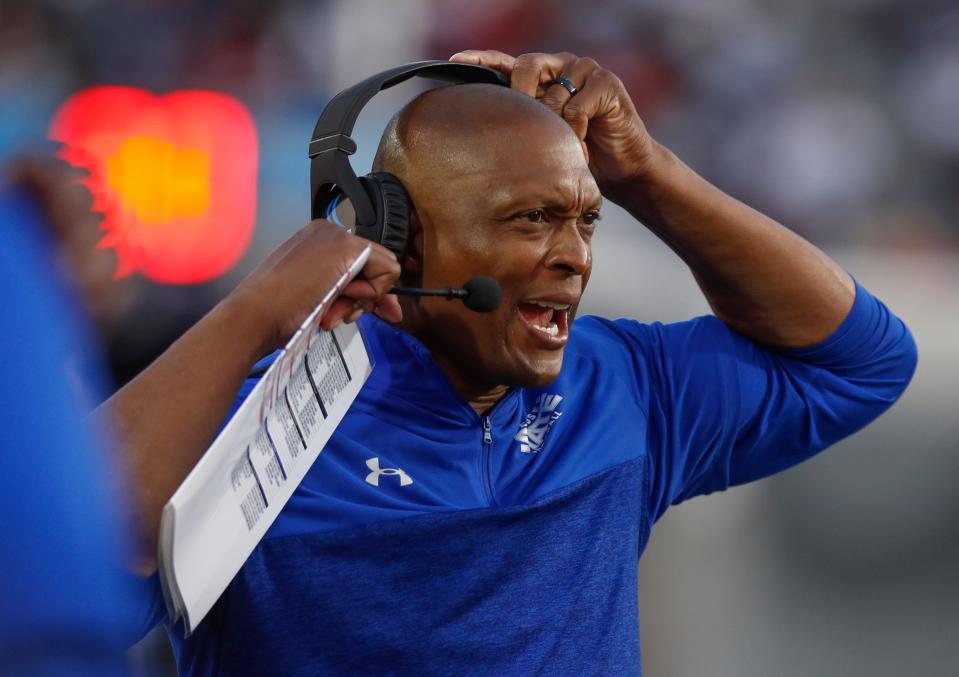 Sep 11, 2021; Memphis, TN, USA; TSU head coach Eddie George yells over his microphone in the Southern Heritage Classic between Tennessee State University and Jackson State University at Liberty Bowl Memorial Stadium in Memphis, Tenn., on Saturday, Sept. 11, 2021. Mandatory Credit: Henry Taylor-USA TODAY Sports