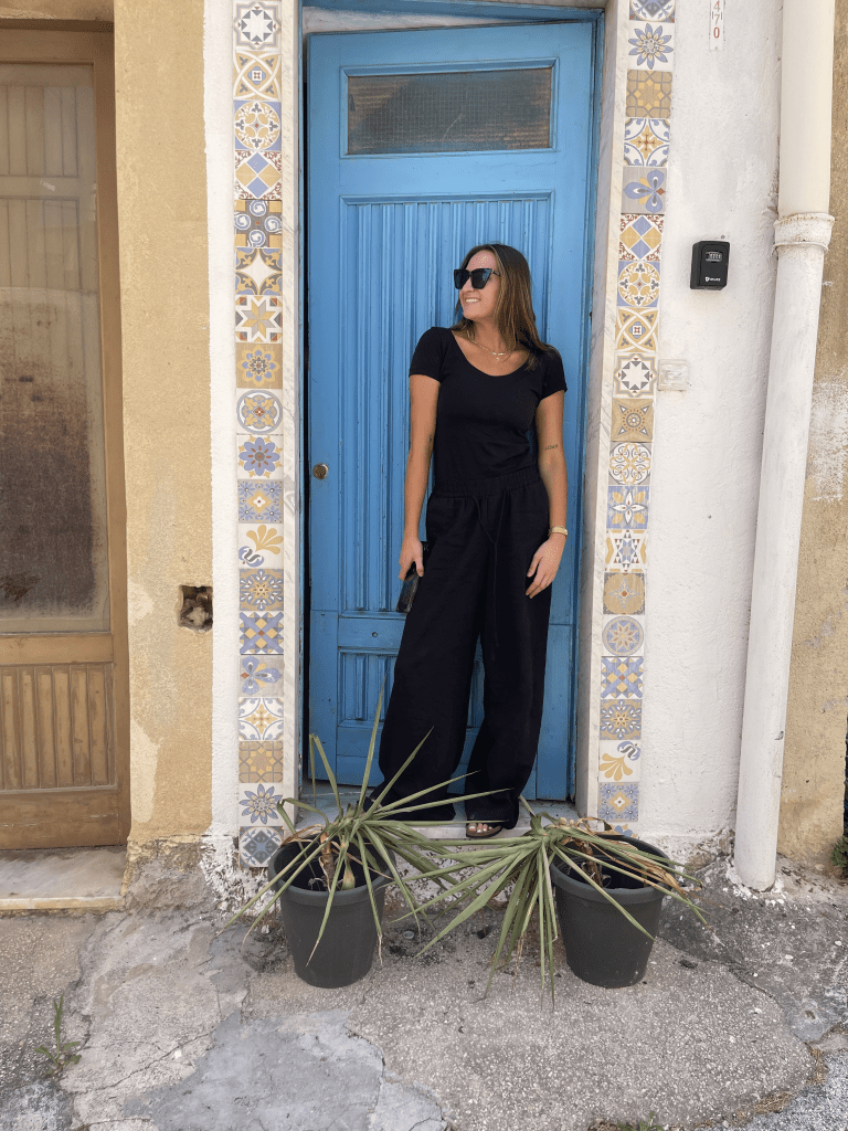 Photo of a woman wearing a black outfit. 