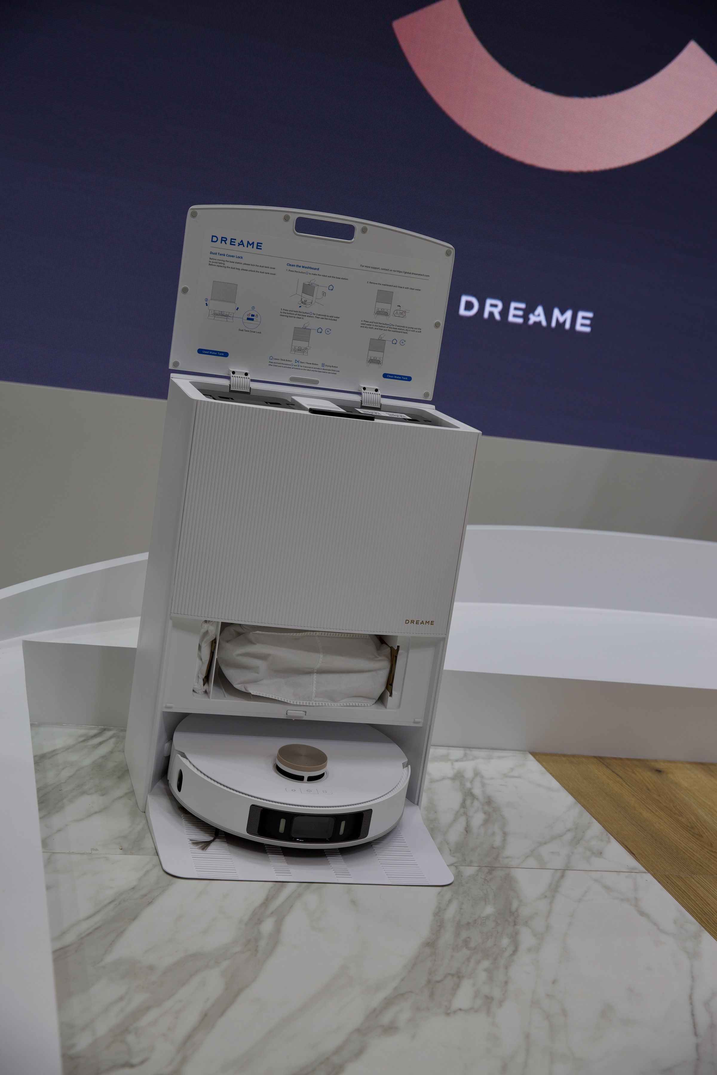 The DreameBot L20 Ultra’s charging dock has an auto-empty bin (middle) and two water tanks to hold clean and dirty water (top). A separate kit can hook the dock into your plumbing to keep the tanks full and fresh.