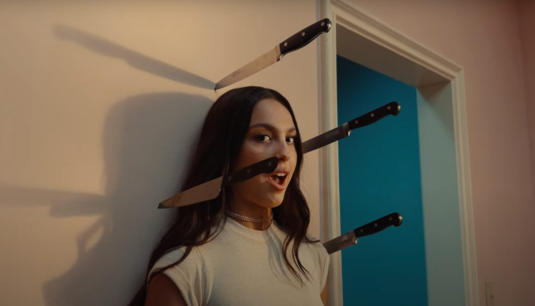 Olivia Rodrigo Unleashes a Gang of Evil Olivias in "get him back!" Video: Watch