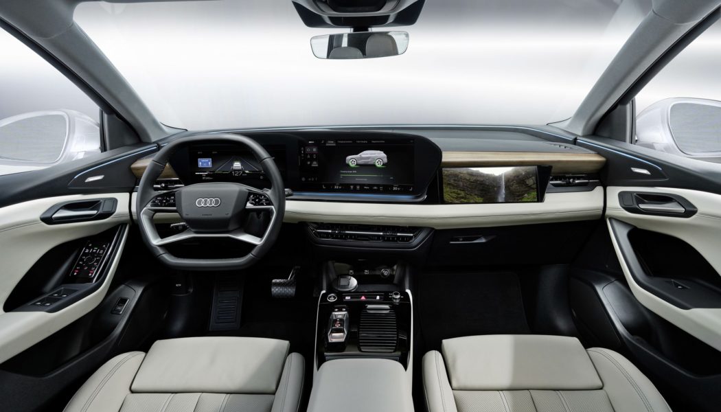 The Audi Q6 E-tron has three screens lighting up the entire dashboard