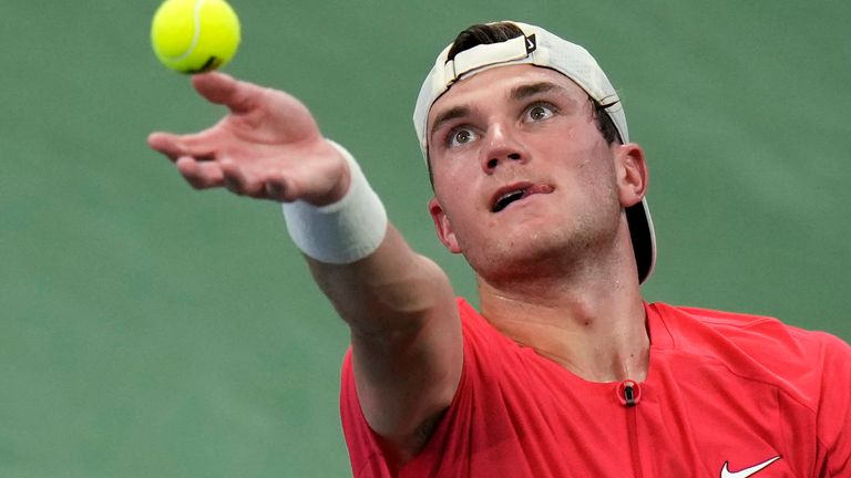 Jack Draper, of Great Britain, serves to Andrey Rublev, of Russia, during the fourth round of the U.S. Open tennis championships, Monday, Sept. 4, 2023, in New York. (AP Photo/Seth Wenig)