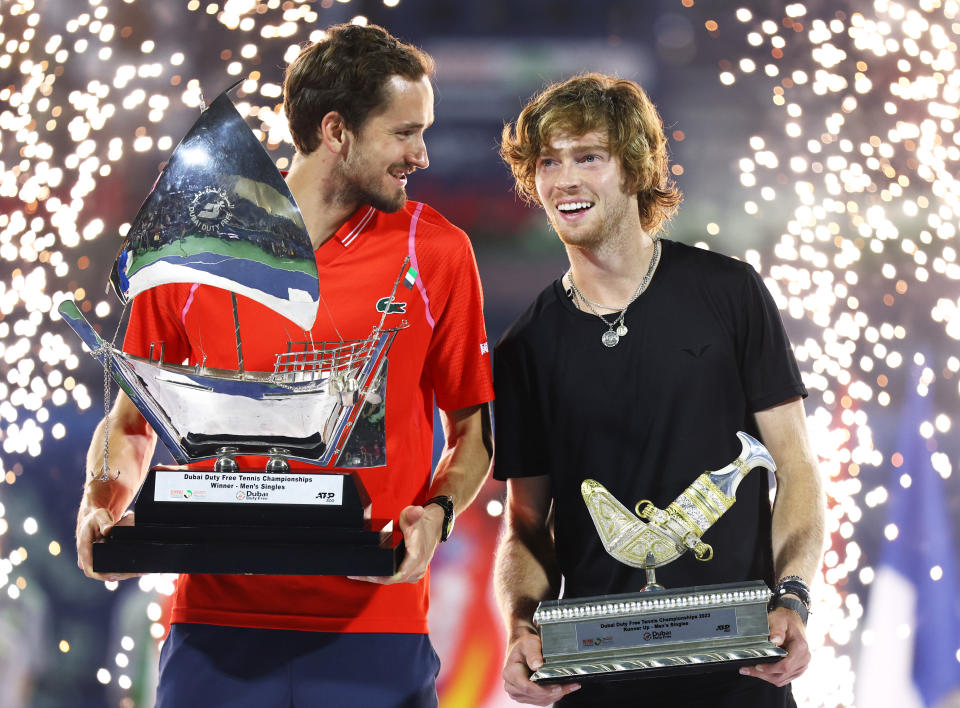 Daniil Medvedev (L) and Andrey Rublev celebrate victories. (Francois Nel/Getty Images)