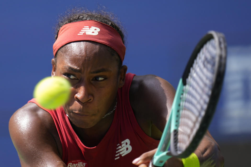 Coco Gauff returns a shot during the quarterfinals. (Manu Fernandez/AP)