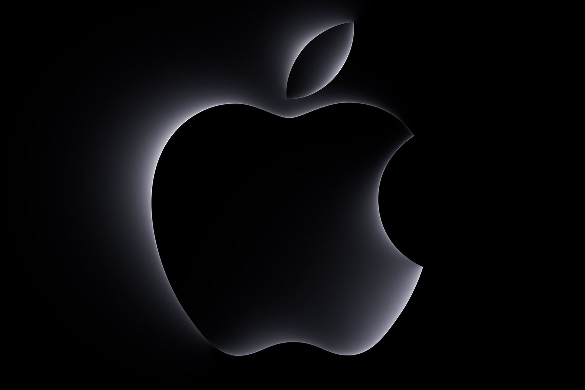 Apple logo with the words “scary fast” on a black background.