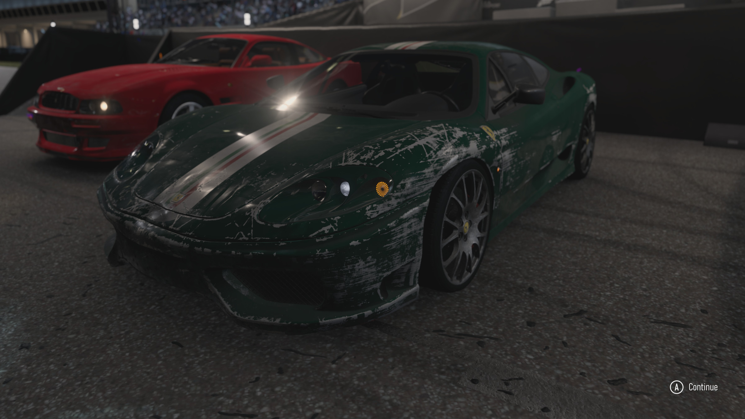 Forza Motorsport screenshot showing a scratched up Ferrari.