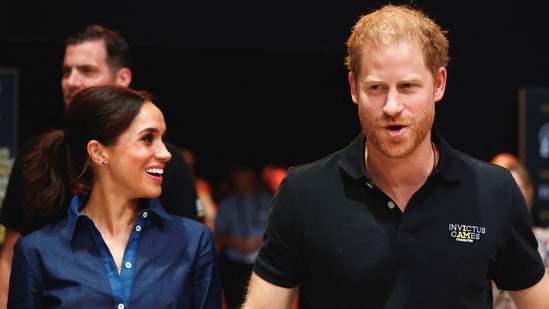 Britain's Prince Harry, Duke of Sussex and his wife Meghan, Duchess of Sussex, attend the sitting volleyball finals at the 2023 Invictus Games, an international multi-sport event for injured soldiers, in Duesseldorf, Germany September 15, 2023. (REUTERS)