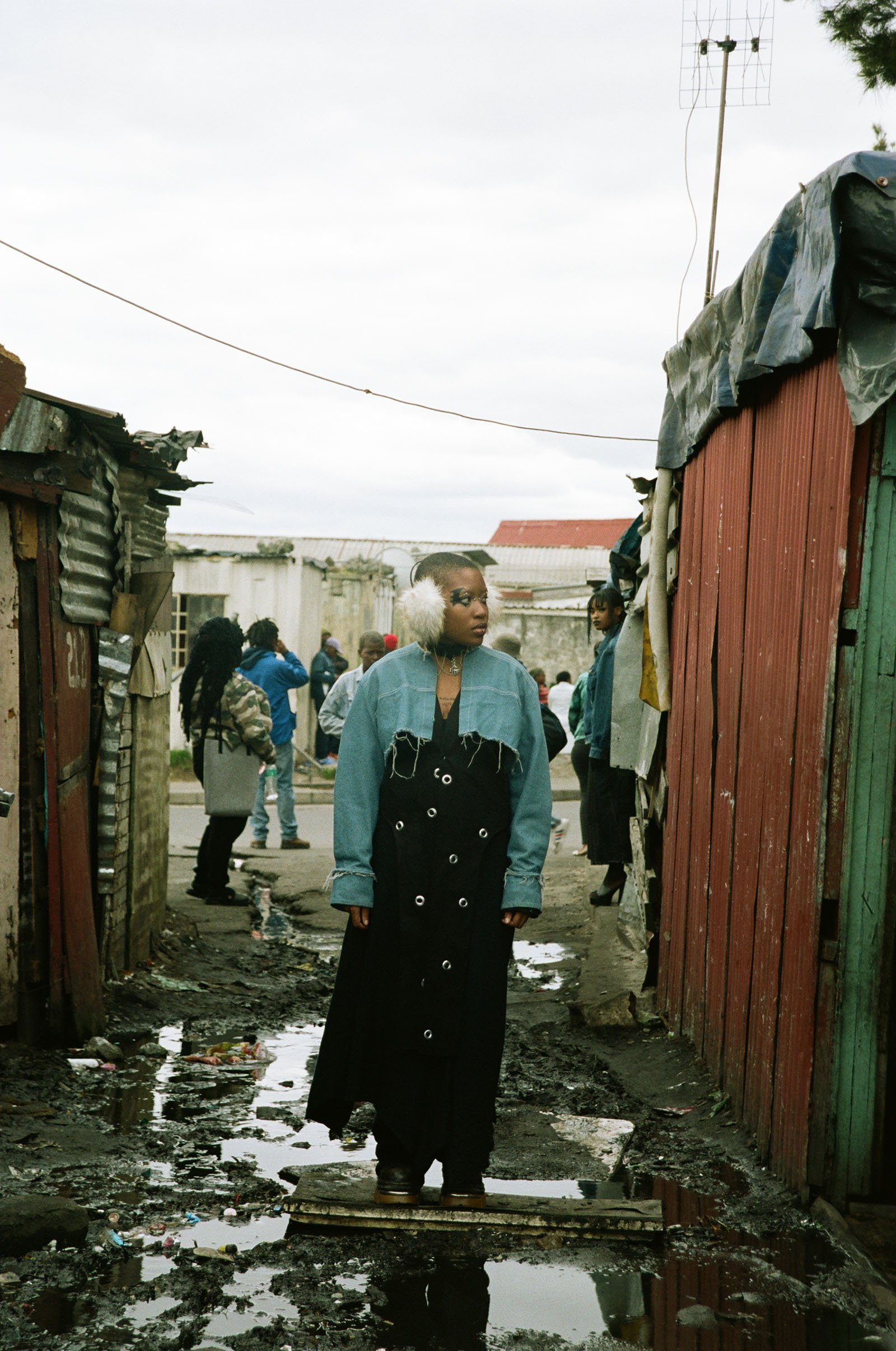 A woman in an alley.