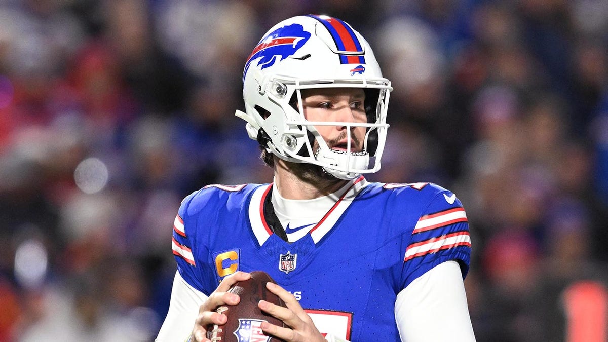 Josh Allen looks to pass