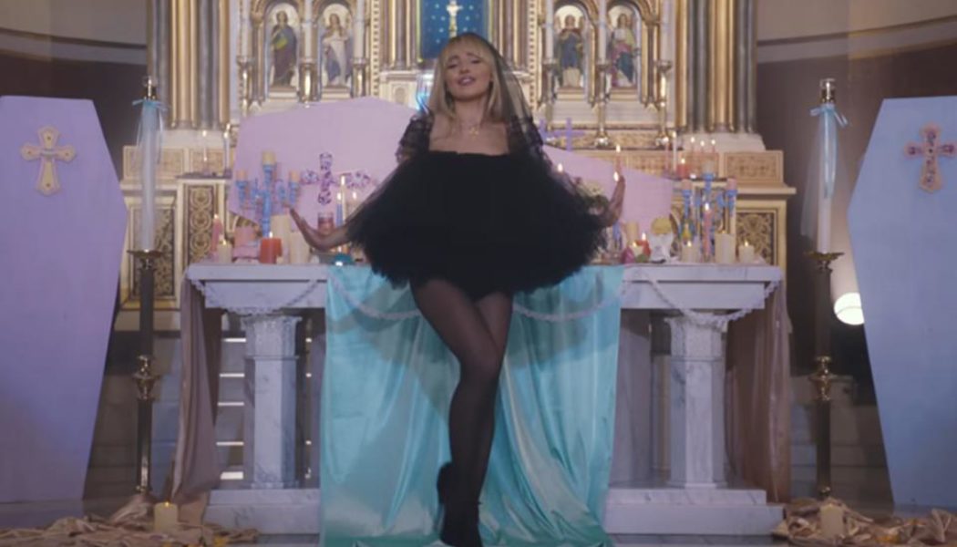 Catholic priest could be demoted after US pop star filmed provocative music video in church