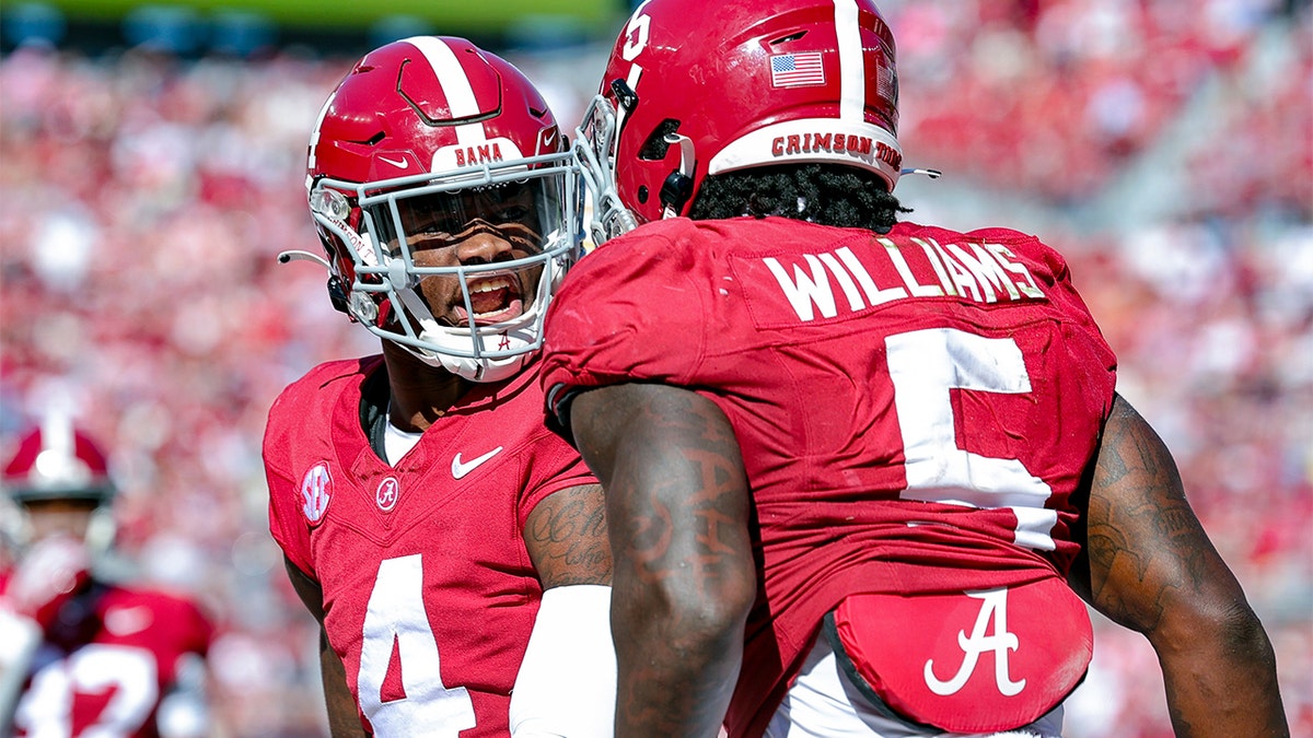 Alabama Crimson Tide quarterback Jalen Milroe celebrates with his teammate