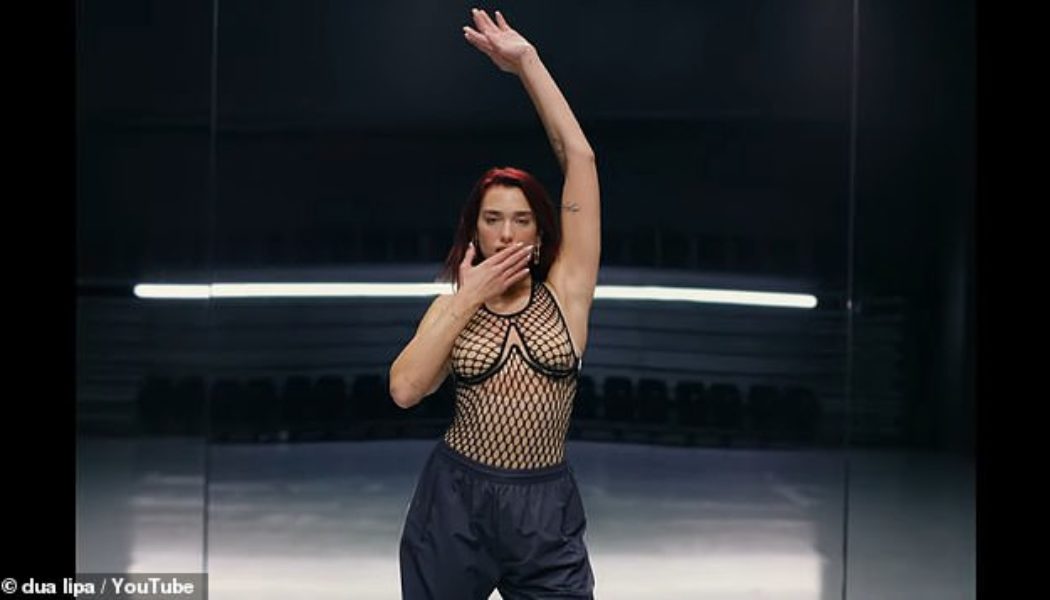 Dua Lipa wows in skimpy mesh vest in her new music video