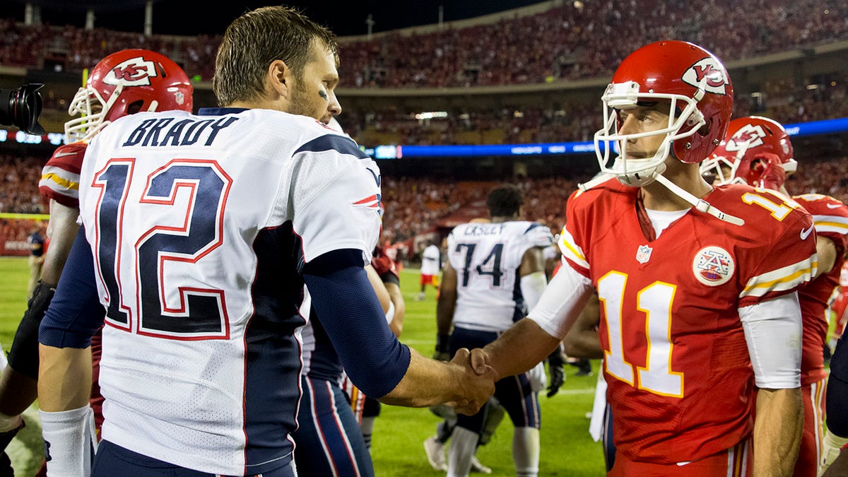 Alex Smith and Tom Brady in 2014