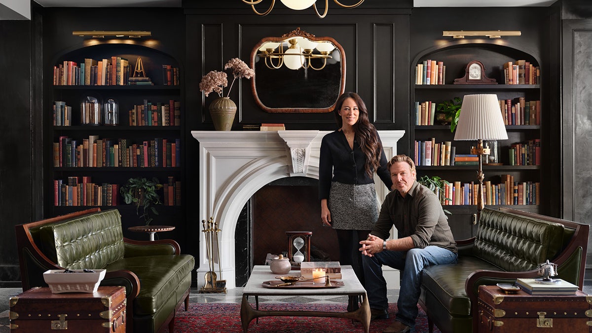 Joanna and Chip Gaines sitting in the lobby of their hotel