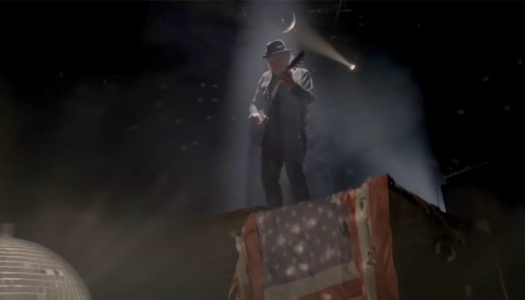 Neil Young shreds "The Star-Spangled Banner" on electric guitar in new "Stand For Peace" video