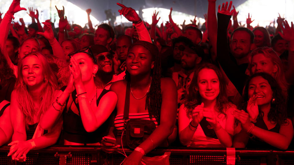 The audience for Nigerian Rema on the Arena Stage cheer on the grounds of Roskilde Festival 2023 - Denmark, June 2023