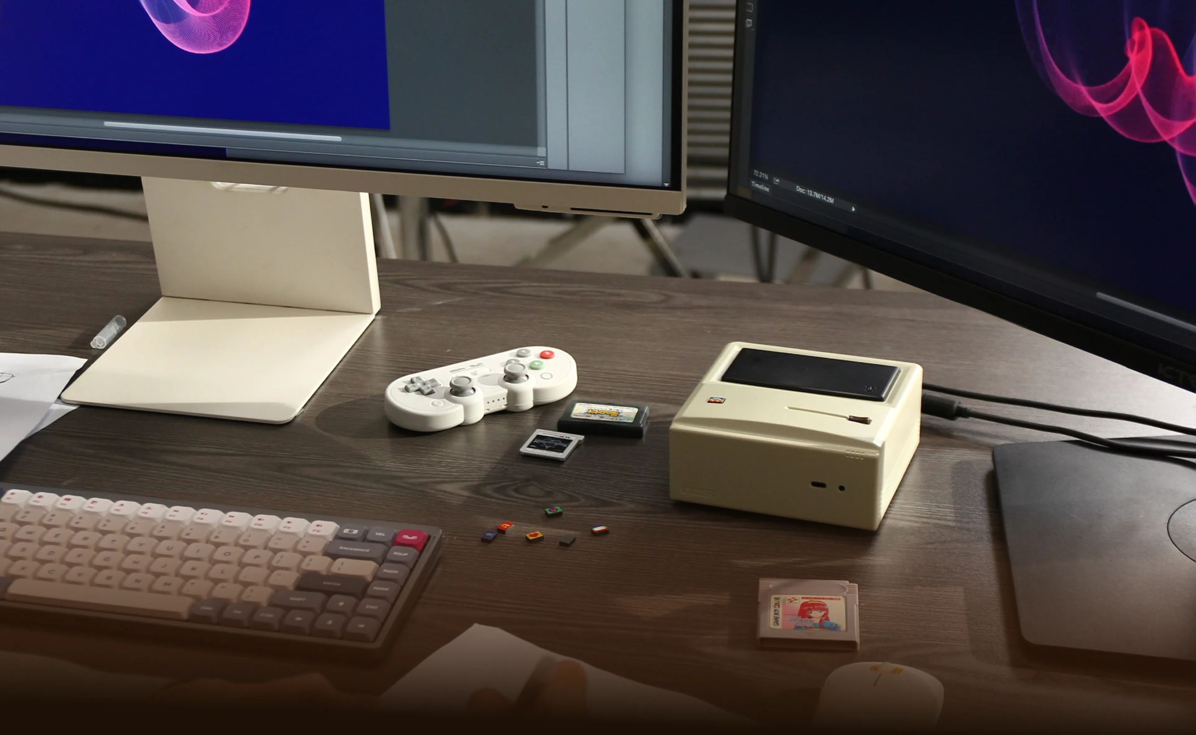 A beige computer sits on a desk, underneath a large monitor.