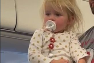 This toddler on a plane is all of us during holiday travel