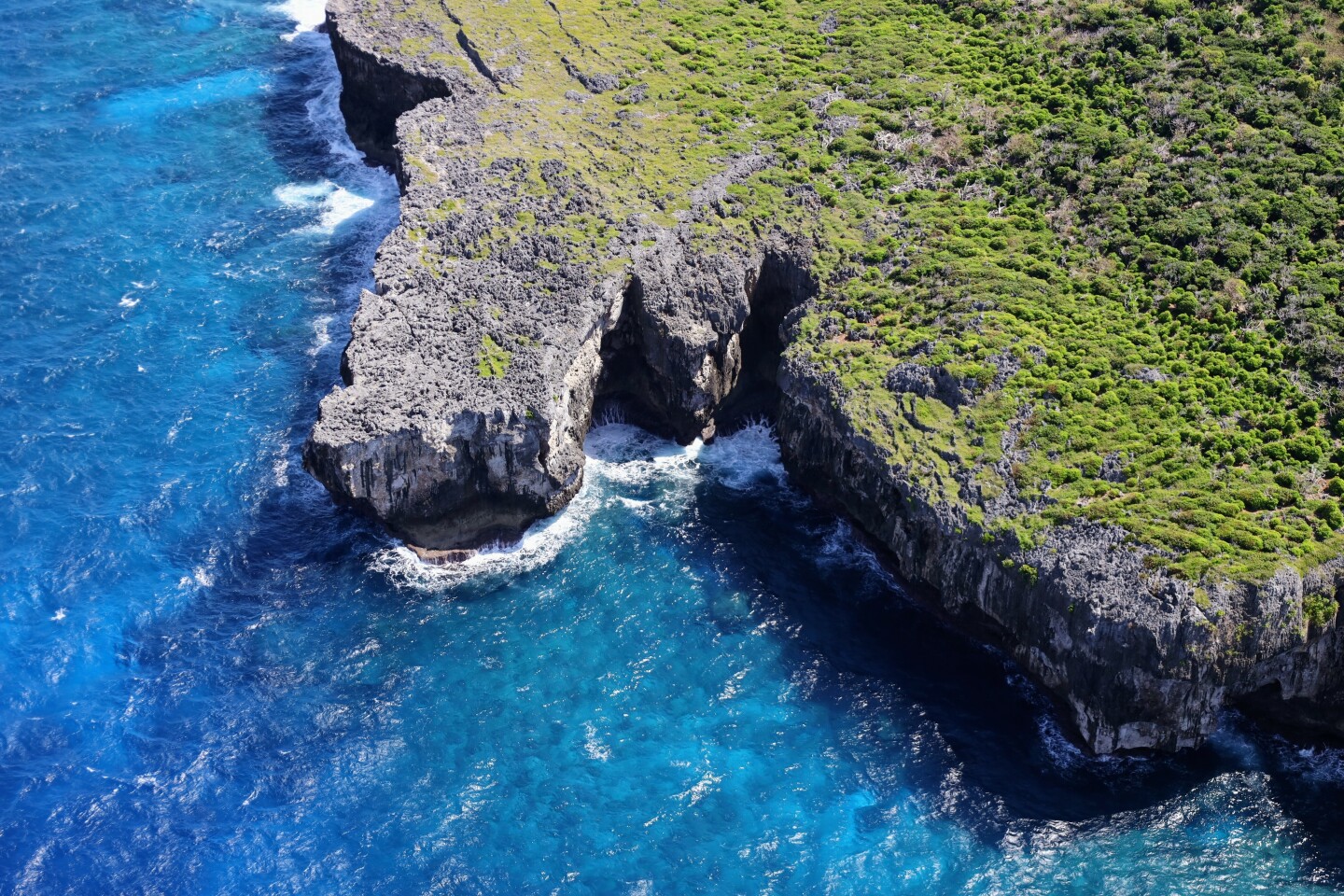 Bird's eye view of coastal bluffs along the Northern Mariana Islands