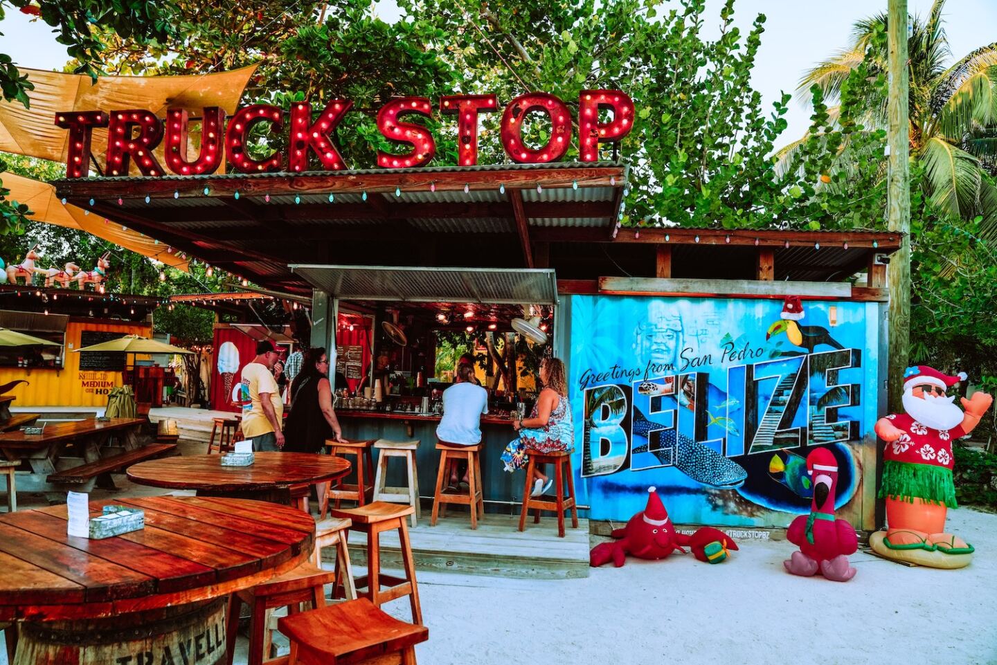 Customers at a bar called Truck Stop in San Pedro, Belize