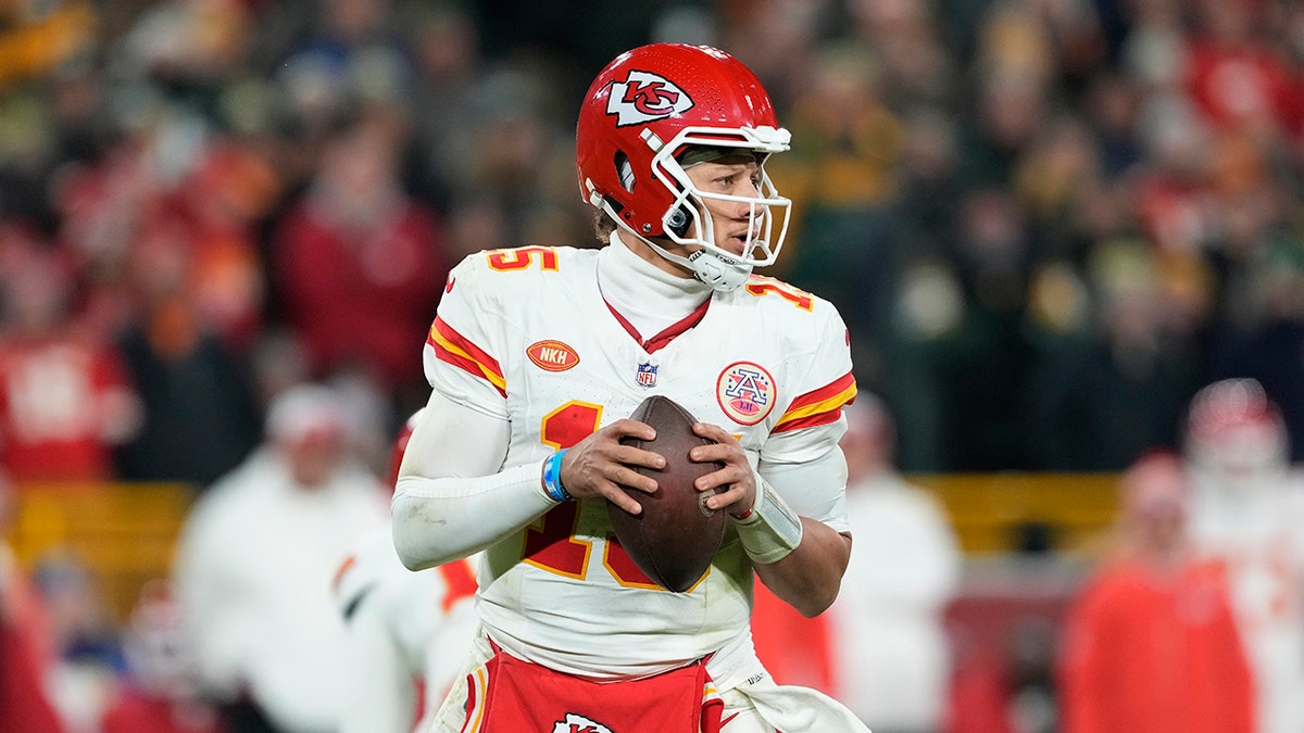 Patrick Mahomes drops back to pass