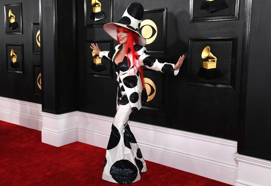 Twain wows with a polka dot suit and hat. 