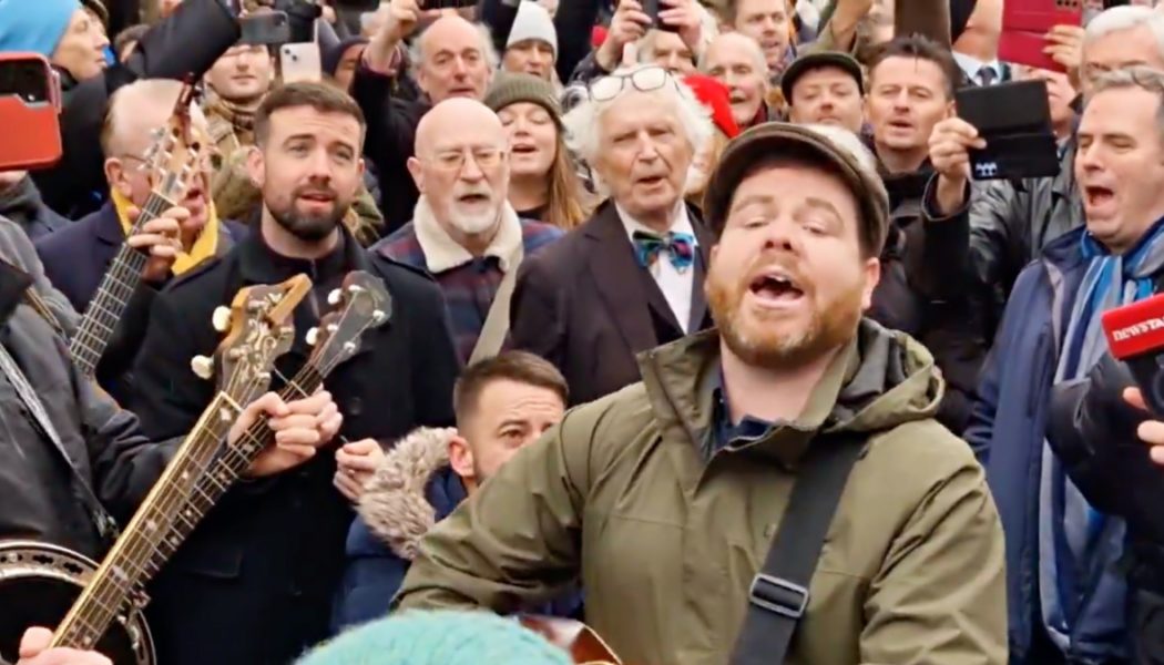 Mourners honor Shane MacGowan by singing Pogues songs on the streets of Dublin