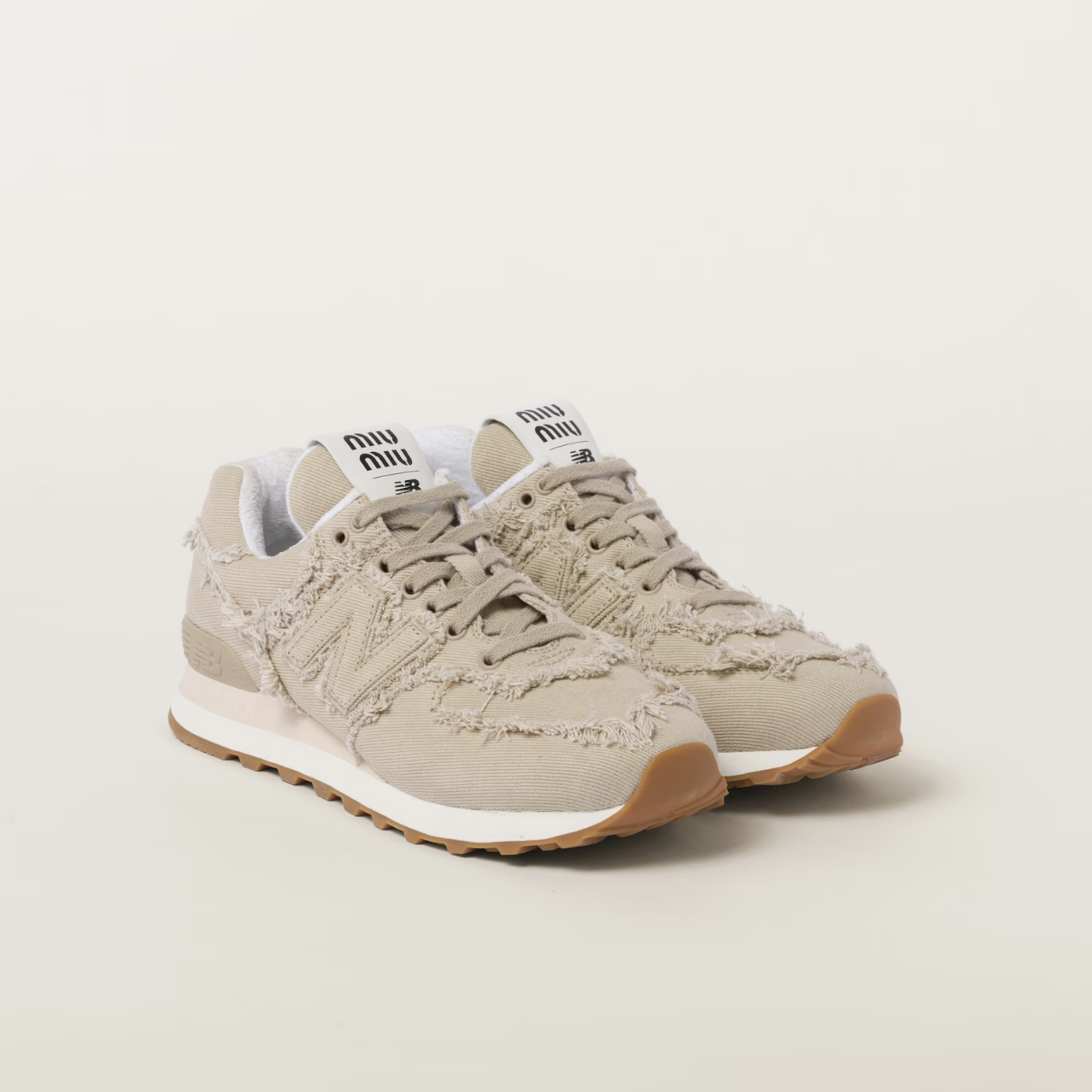 x New Balance 574 Denim Sneakers