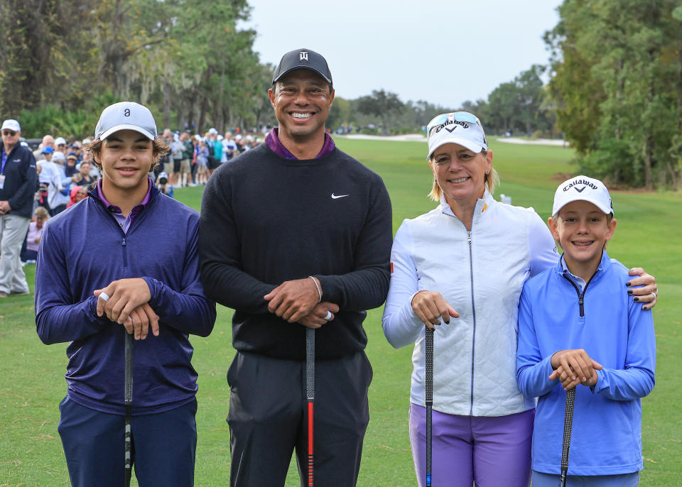 Charlie Woods, Tiger Woods, Annika Sorenstam, Will McGee. (David Cannon/Getty Images)