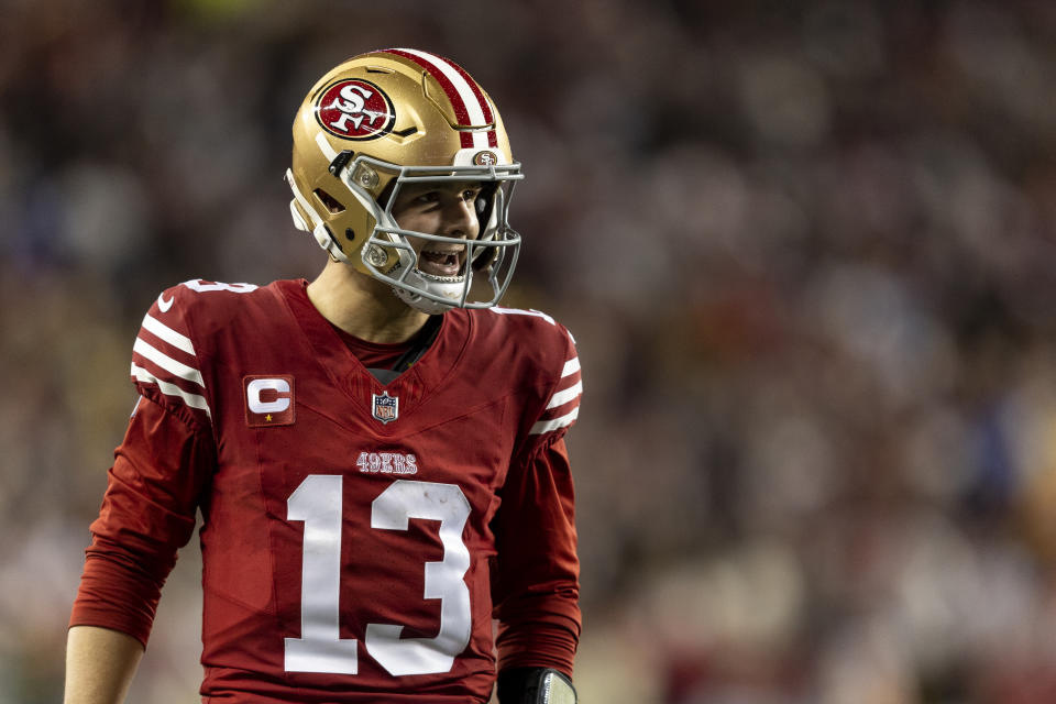 SANTA CLARA, CALIFORNIA - JANUARY 20: Brock Purdy #13 of the San Francisco 49ers celebrates after a touchdown during an NFL divisional round playoff football game between the San Francisco 49ers and the Green Bay Packers at Levi's Stadium on January 20, 2024 in Santa Clara, California. (Photo by Michael Owens/Getty Images)