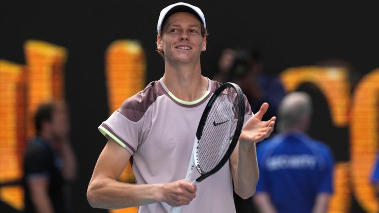 Jannik Sinner of Italy celebrates after defeating Novak Djokovic of Serbia in their semifinal at the Australian Open tennis championships at Melbourne Park, Melbourne, Australia, Friday, Jan. 26, 2024. (AP Photo/Alessandra Tarantino)