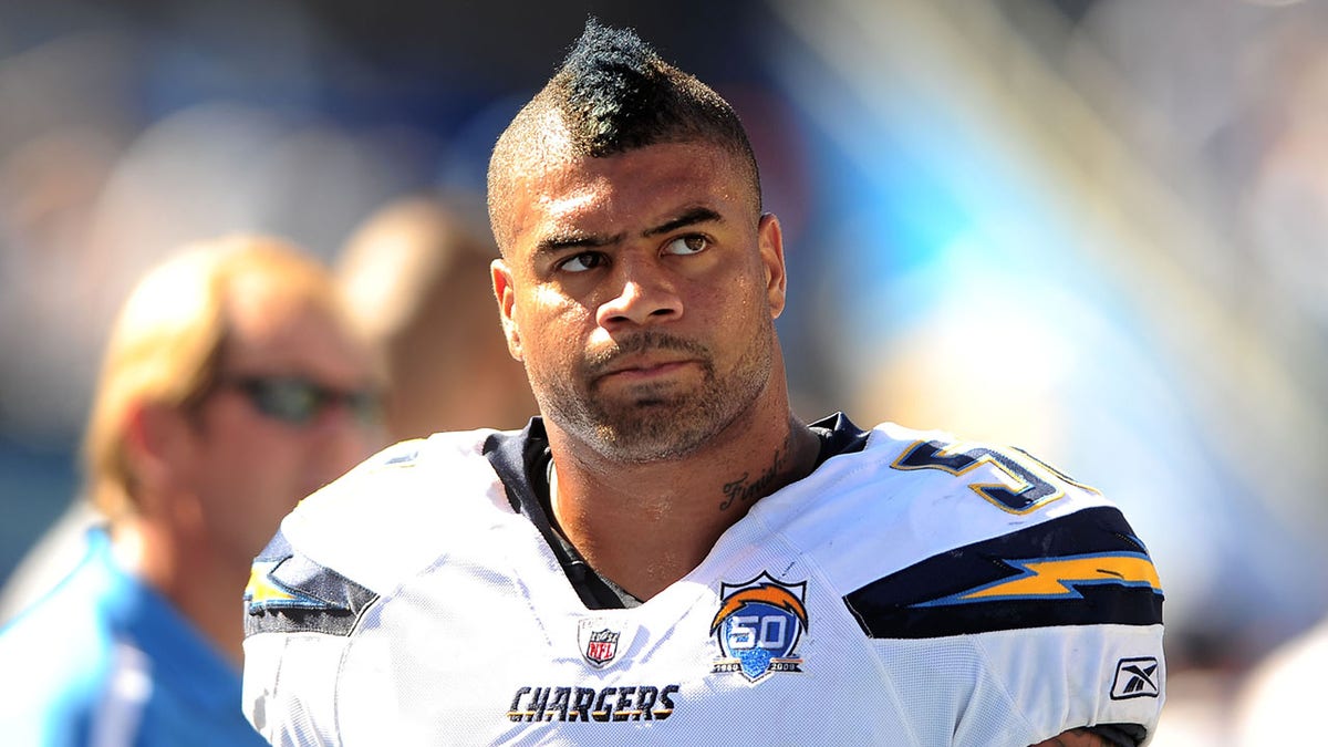 Shawne Merriman looks on