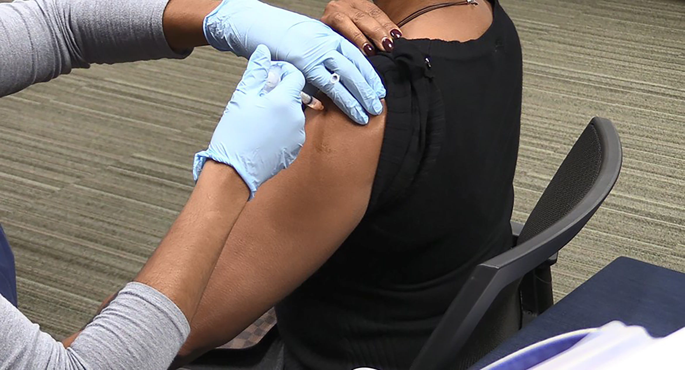 Woman getting flu shot