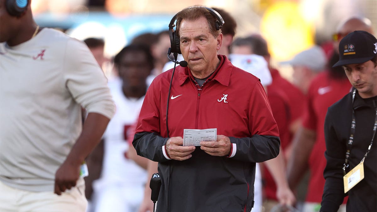 Nick Saban coaches against Michigan