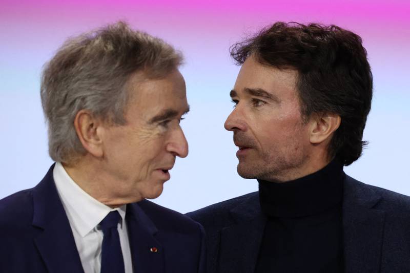 LVMH head Bernard Arnault, left, with Antoine Arnault, chief executive of LVMH Holding Company, in Paris. AFP